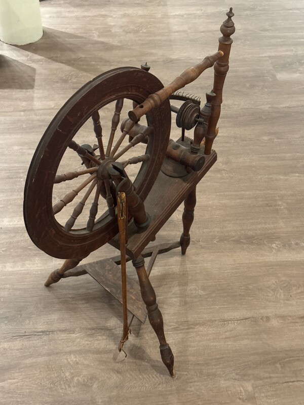 A wooden spinning wheel