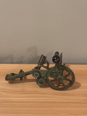 Assembly of iron gears and mechanical components