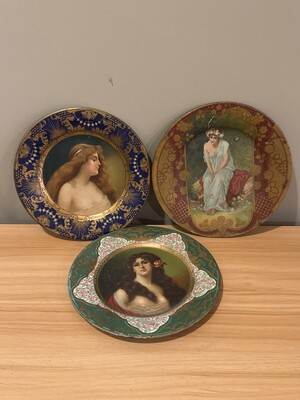 Trio of decorative porcelain plates