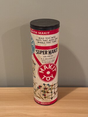Cylindrical cardboard canister for the "Super Makit" toy construction