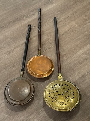 Trio of antique bed warmers