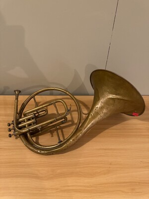French horn rendered in still life