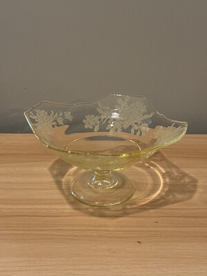 Pale green glass bowl with etched floral detailing