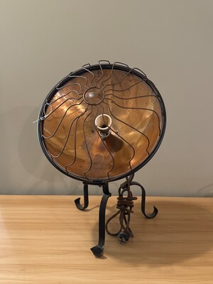 Antique electric heater with a copper