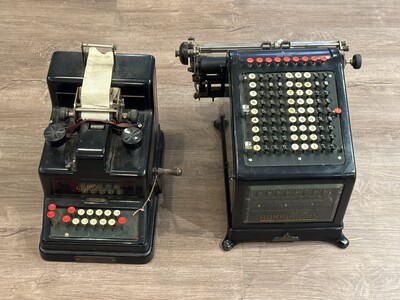Pair of vintage mechanical calculators