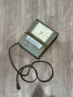 Old-fashioned employee time clock