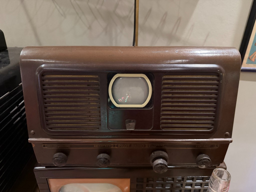 A small brown Pilot television with a tiny screen