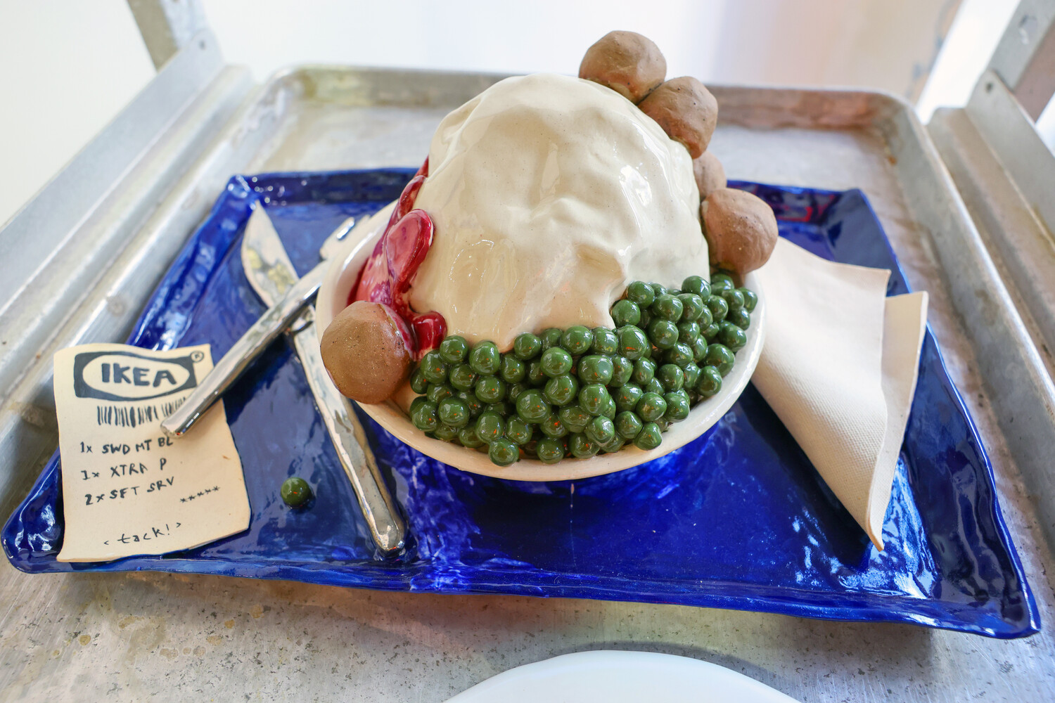 Emalani Artiss, KÖTTBULLAR (Ceramic Tray of Swedish Meatballs) PHOTO BY KELLY O