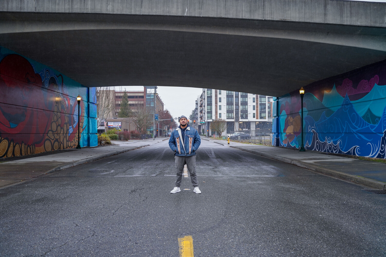 Toka Valu with his mural, HaiKU-MAter SaFEKEeping
