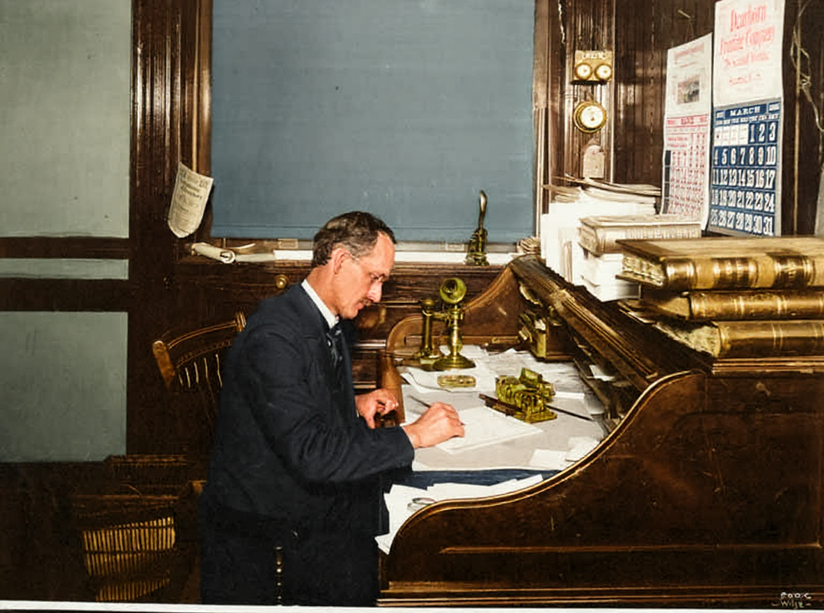 Thomas Prosch at his rolltop desk, c. 1900