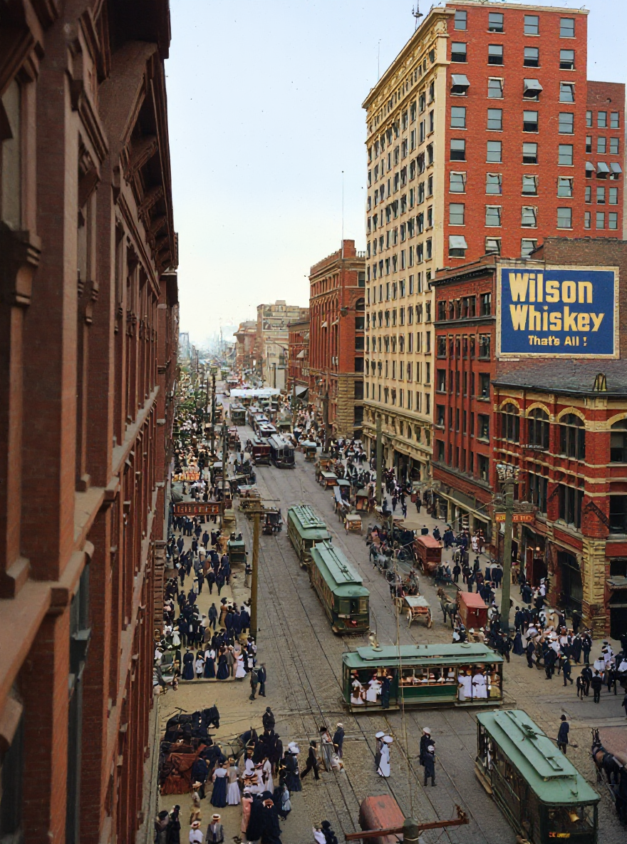 Second Avenue streetcars and crowds, c. 1909